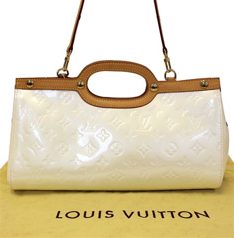 small cream louis vuitton bag|louis vuitton cream shoulder bag.